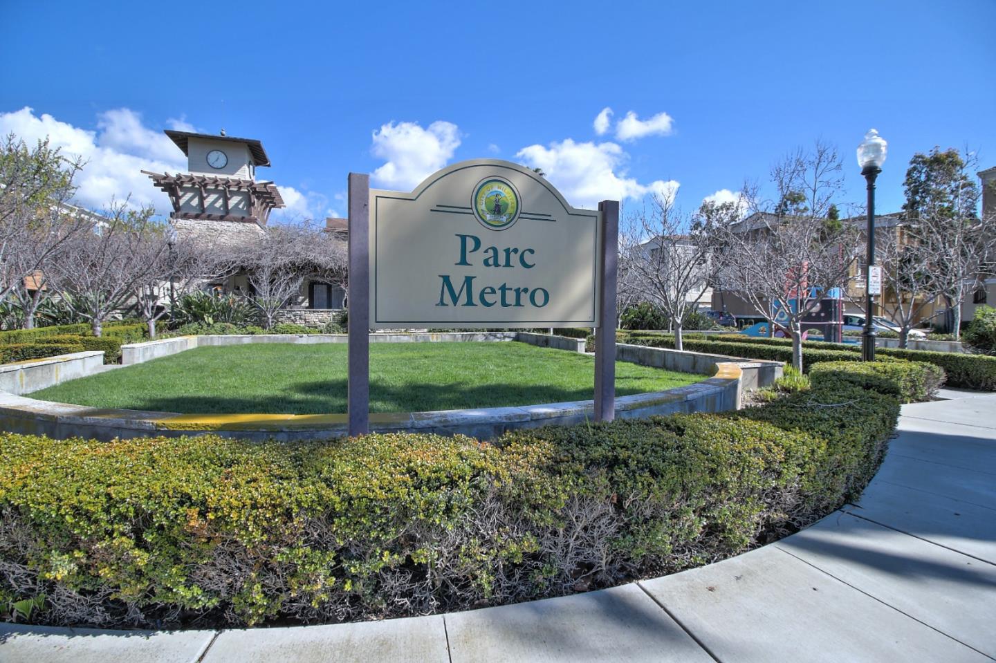 43 Rain Walk Milpitas, CA 95035 - Photo 38 of 48 a view of a street with a building and a street sign
