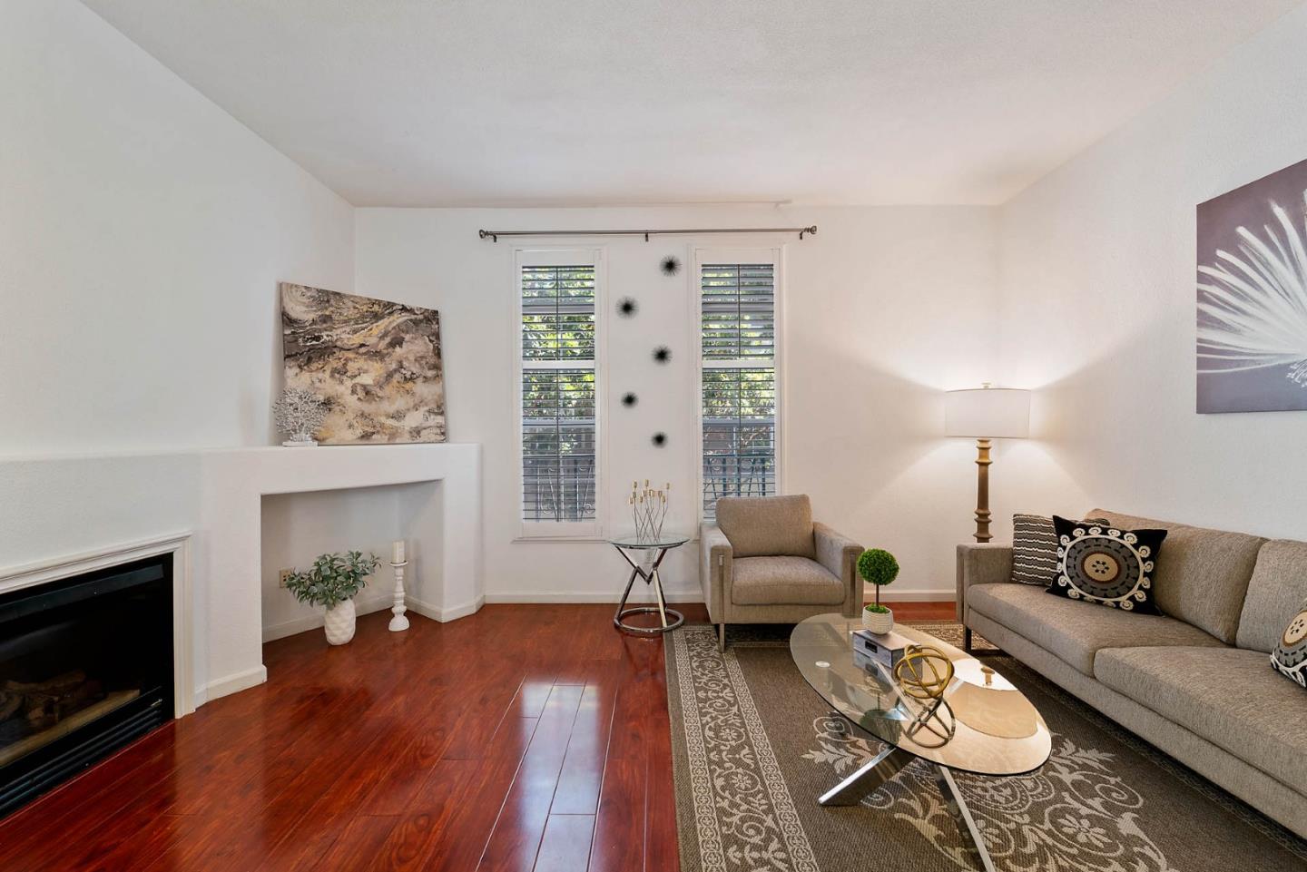 43 Rain Walk Milpitas, CA 95035 - Photo 6 of 48 a living room with furniture and a fireplace