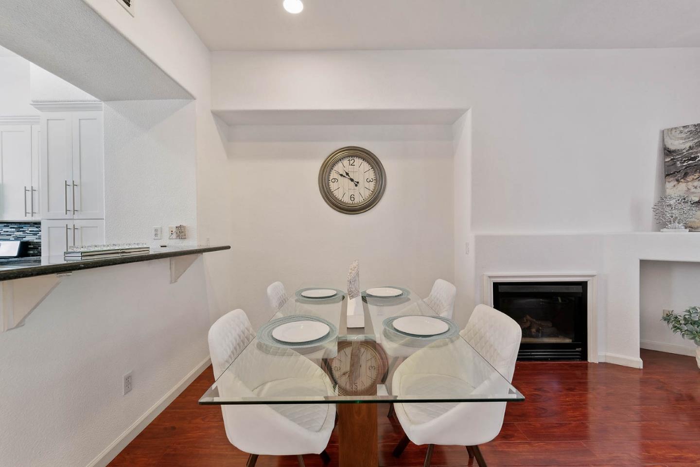 43 Rain Walk Milpitas, CA 95035 - Photo 9 of 48 a view of a dining room with furniture and wooden floor