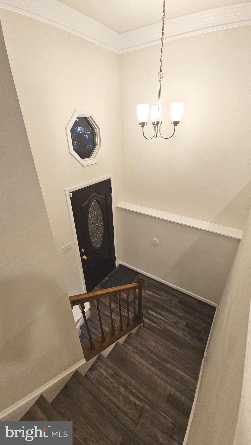 809 Duvall Highway Pasadena, MD 21122 - Photo 2 of 38 a view of entryway with wooden floor