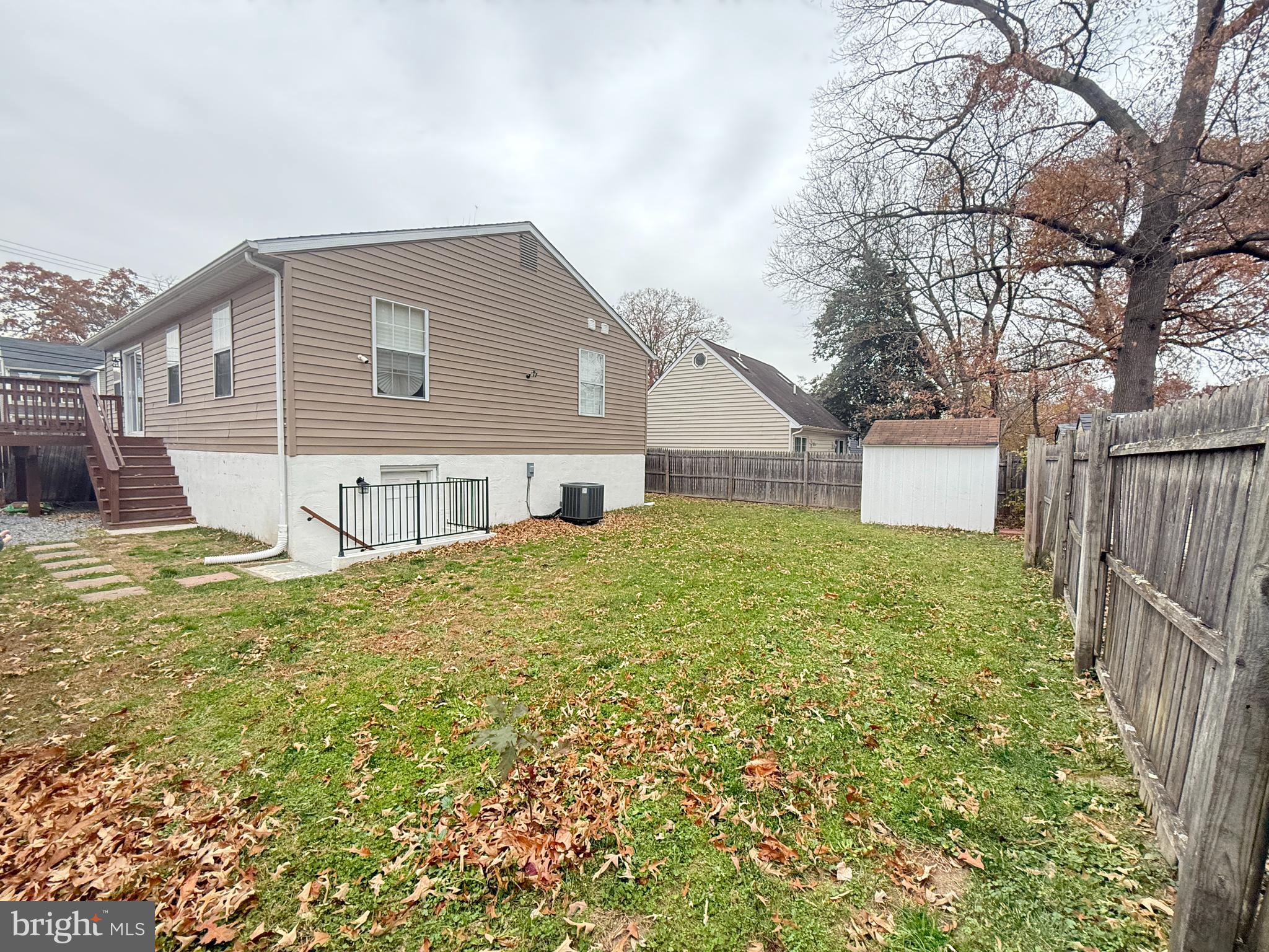 809 Duvall Highway Pasadena, MD 21122 - Photo 34 of 38 a view of a house with a backyard