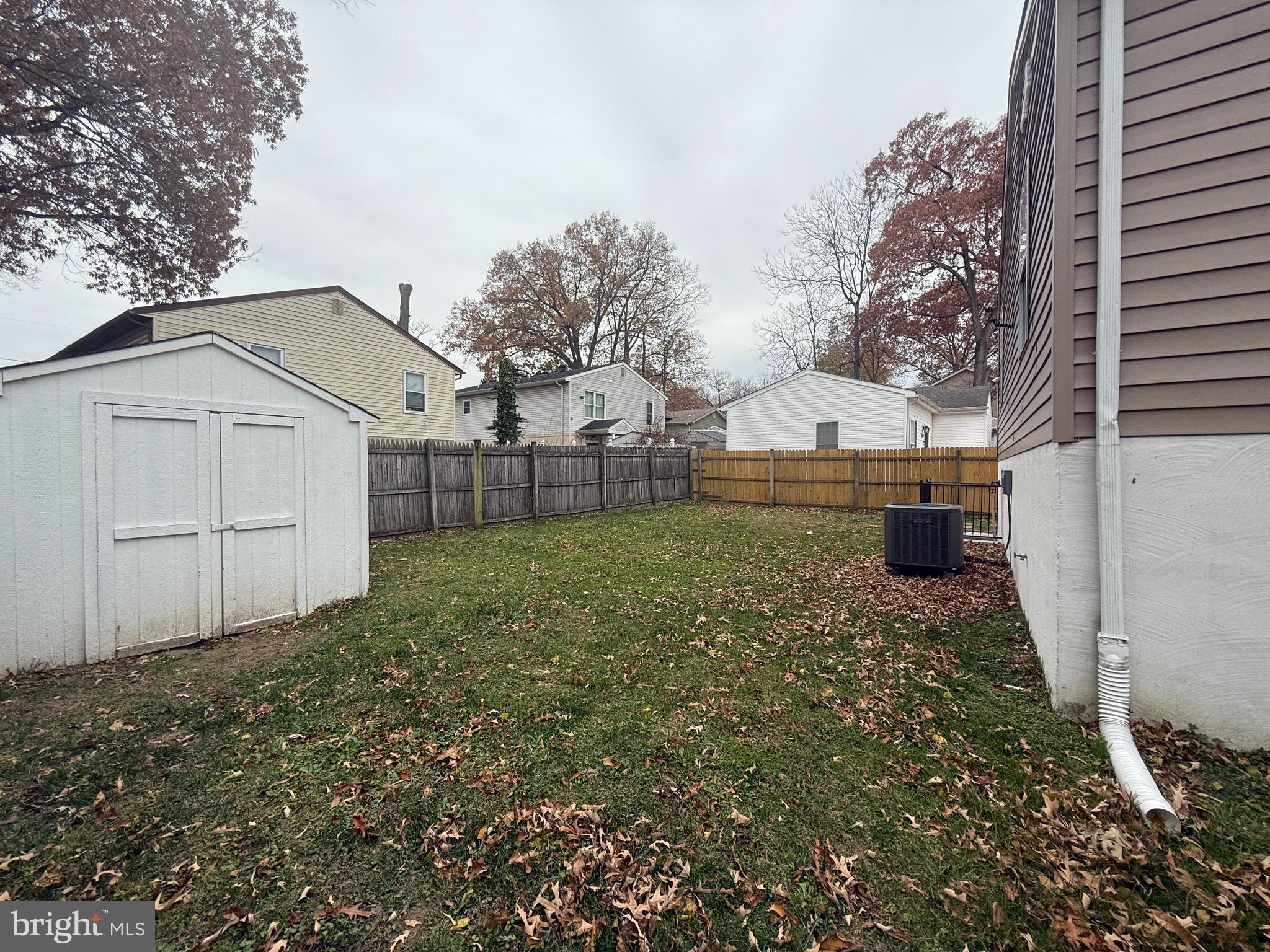 809 Duvall Highway Pasadena, MD 21122 - Photo 35 of 38 a front view of a house with a yard