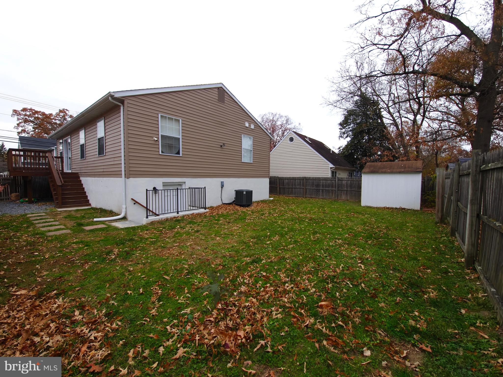 809 Duvall Highway Pasadena, MD 21122 - Photo 38 of 38 a view of a house with a yard