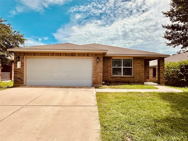 a house view with a outdoor space