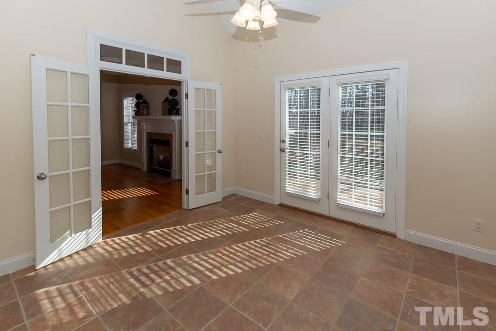 5004 Martin Farm Road Raleigh, NC 27613 - Photo 11 of 25 a view of an empty room with a window