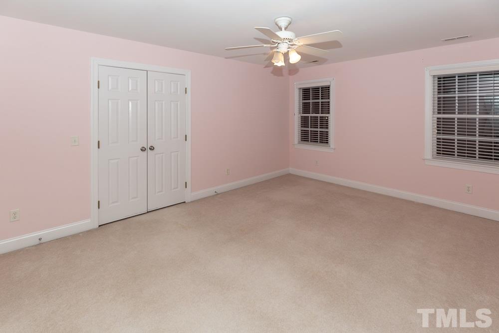 5004 Martin Farm Road Raleigh, NC 27613 - Photo 20 of 25 a view of an empty room with a window