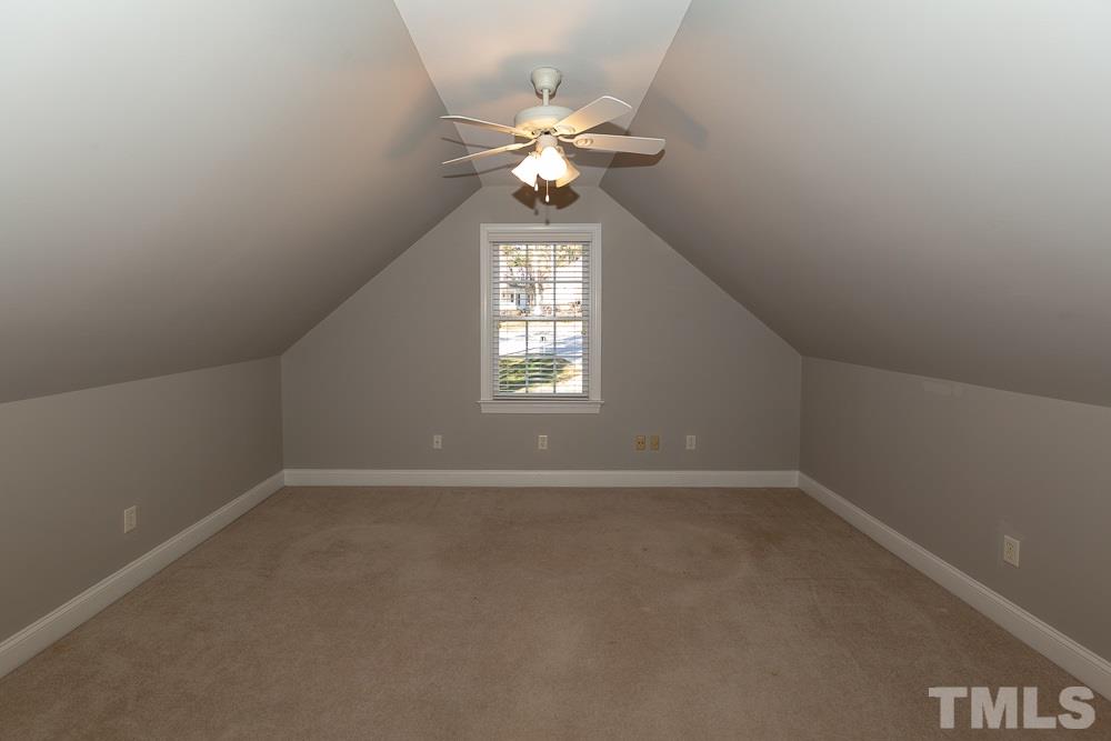 5004 Martin Farm Road Raleigh, NC 27613 - Photo 21 of 25 a view of an empty room with a window