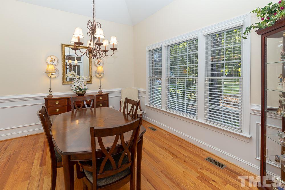 5004 Martin Farm Road Raleigh, NC 27613 - Photo 4 of 25 a view of a dining room with furniture window and outside view