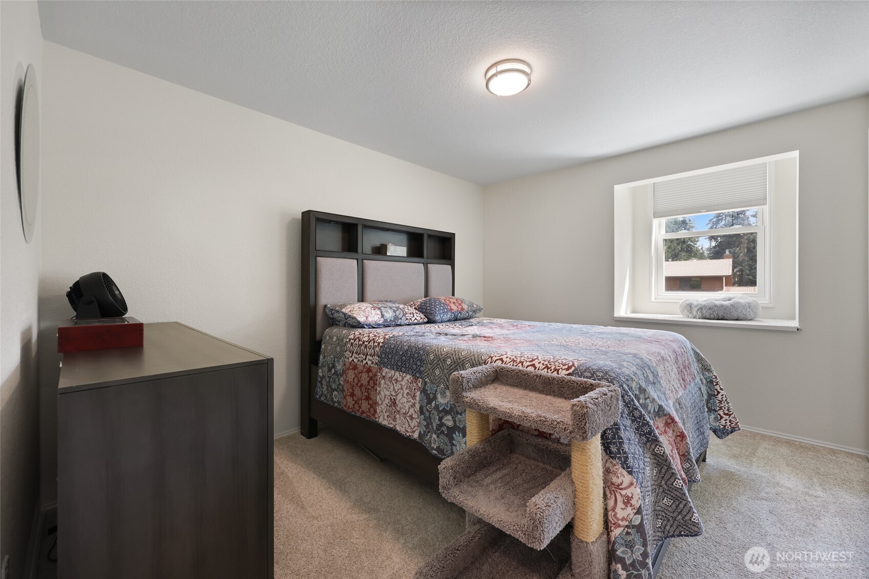 2715 Walnut Loop Northwest Olympia, WA 98502 - Photo 23 of 37 a bedroom with a bed and a window