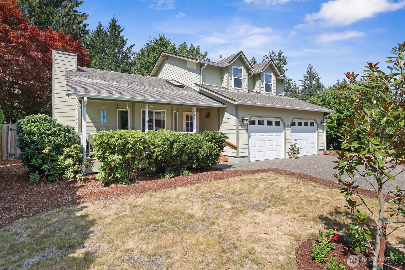 2715 Walnut Loop Northwest Olympia, WA 98502 - Photo 37 of 37 front view of a house with a yard