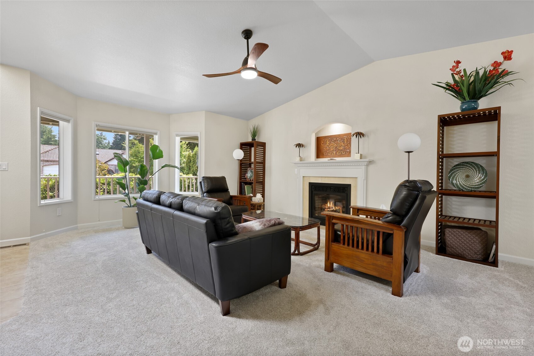 2715 Walnut Loop Northwest Olympia, WA 98502 - Photo 4 of 37 a living room with furniture and a fireplace