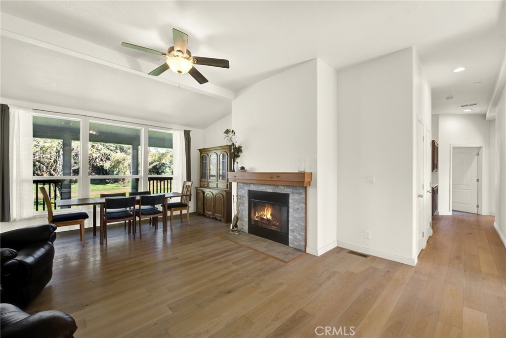 23580 Loleta Avenue Corning, CA 96021 - Photo 11 of 70 a living room with furniture and a fireplace
