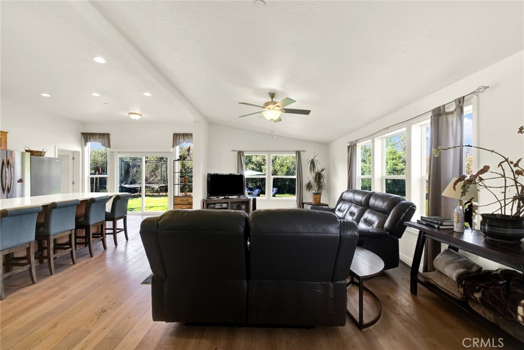 23580 Loleta Avenue Corning, CA 96021 - Photo 15 of 70 a view of a dining room with furniture window and wooden floor