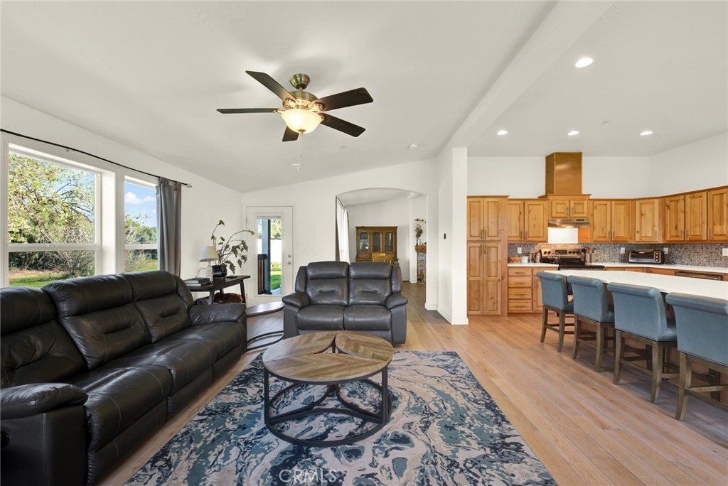 23580 Loleta Avenue Corning, CA 96021 - Photo 20 of 70 a living room with furniture and kitchen view