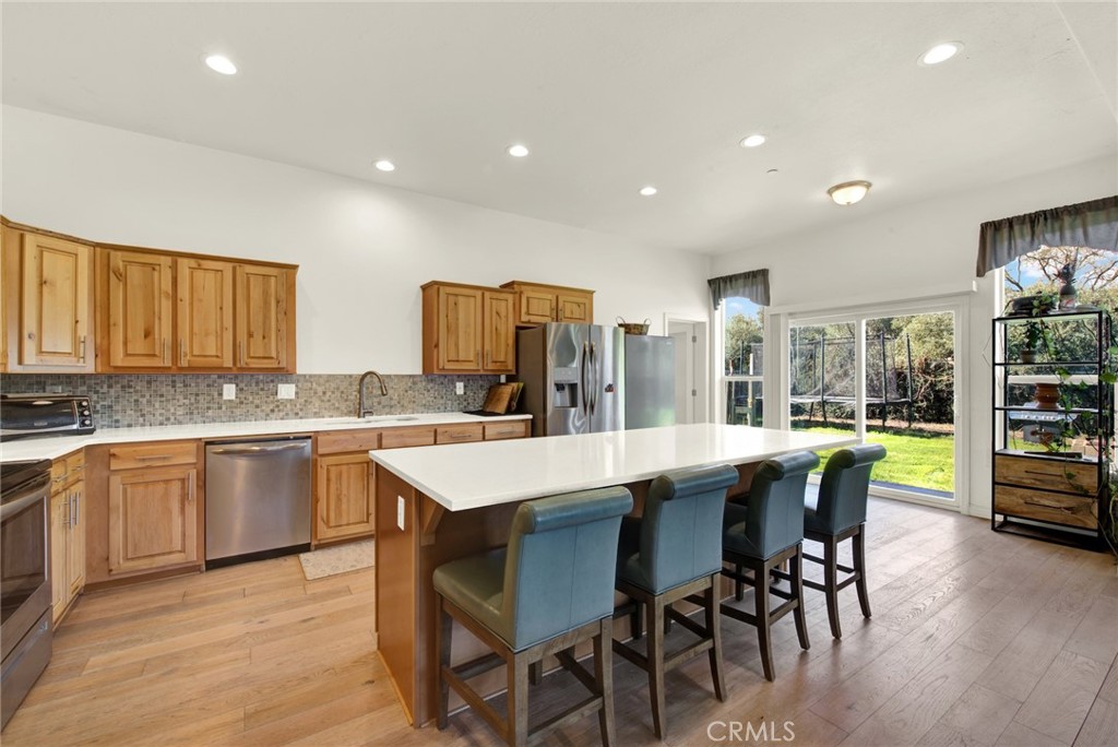 23580 Loleta Avenue Corning, CA 96021 - Photo 23 of 70 a kitchen with a table and chairs in it
