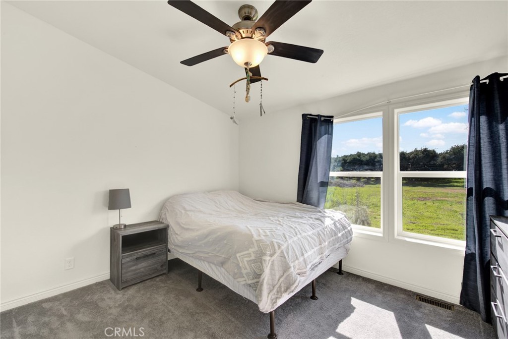 23580 Loleta Avenue Corning, CA 96021 - Photo 45 of 70 a bedroom with a bed and a window