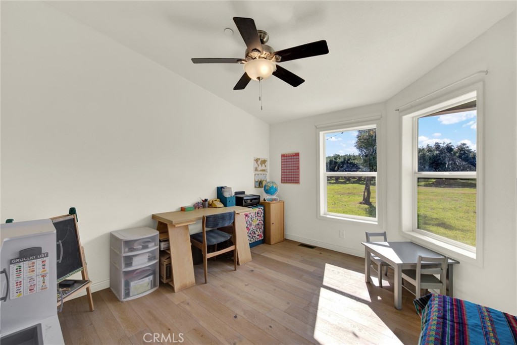 23580 Loleta Avenue Corning, CA 96021 - Photo 48 of 70 a workspace with furniture hardwood and a window