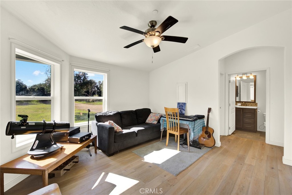 23580 Loleta Avenue Corning, CA 96021 - Photo 50 of 70 a living room with furniture and a large window