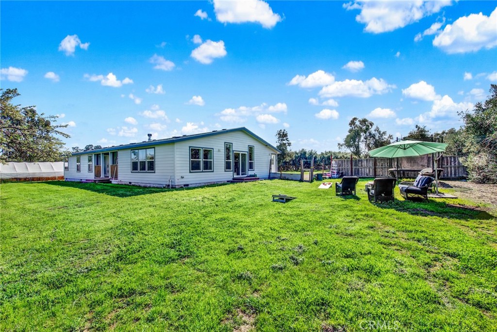23580 Loleta Avenue Corning, CA 96021 - Photo 59 of 70 a view of an house with backyard space and sitting area
