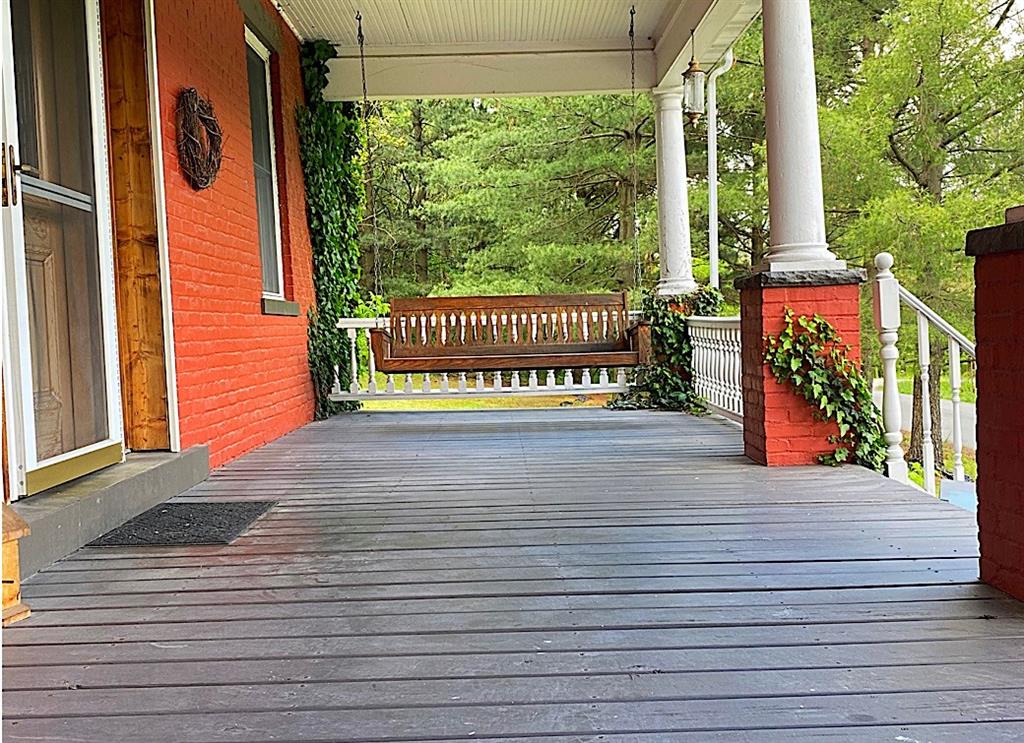 159 Mellingertown Road Mount Pleasant, PA 15666 - Photo 4 of 25 Large covered porch with swing