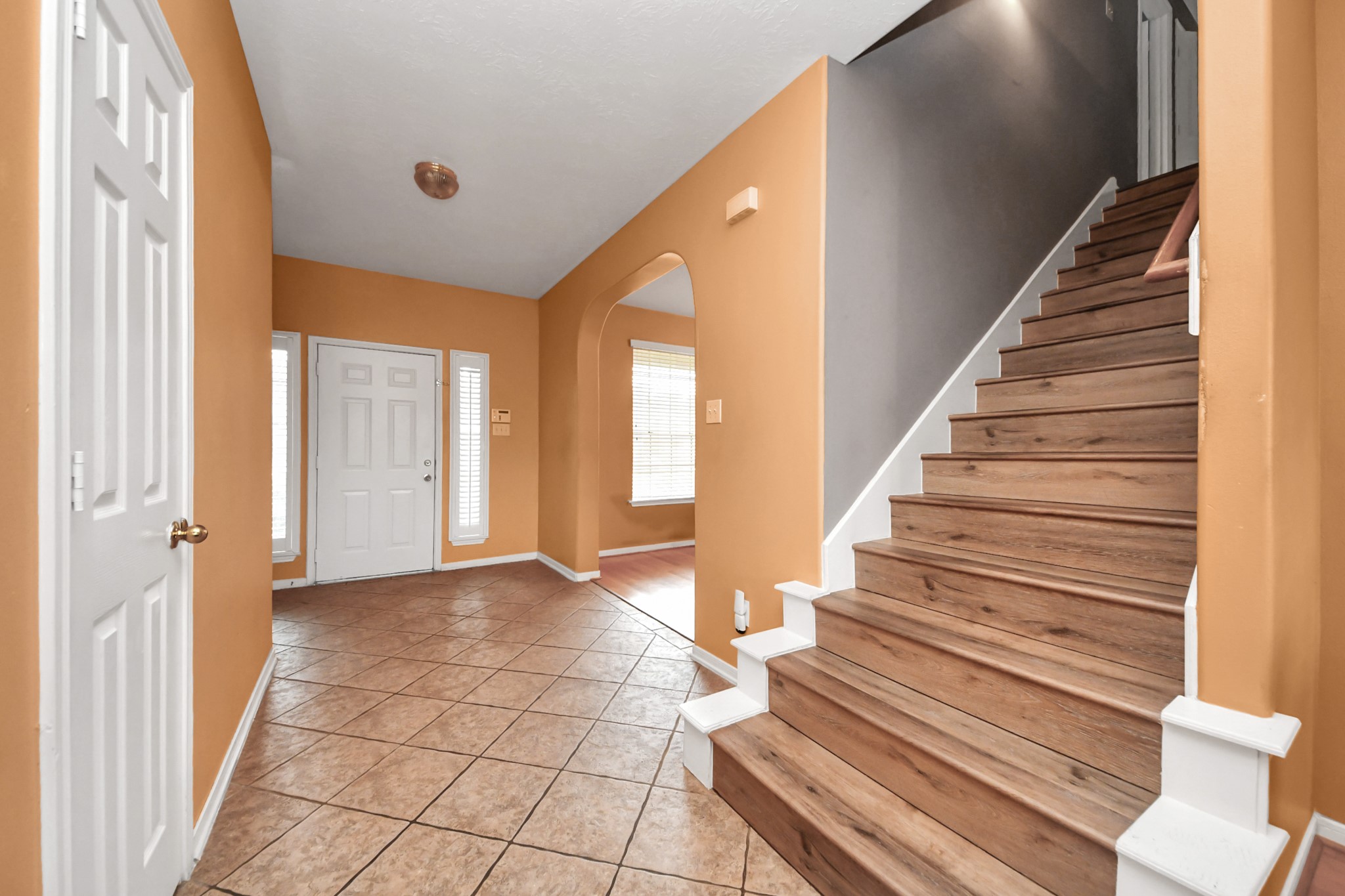 23814 Spring Dane Drive Spring, TX 77373 - Photo 12 of 41 a view of entryway and hall with wooden floor