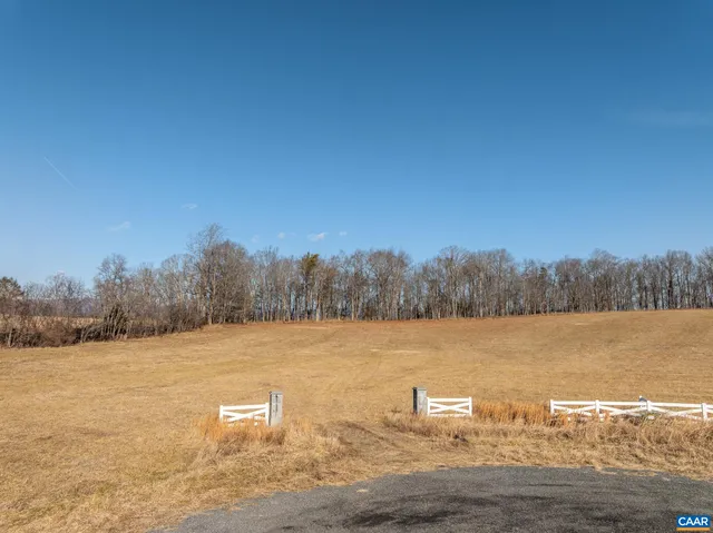 a view of lake with mountain in the background