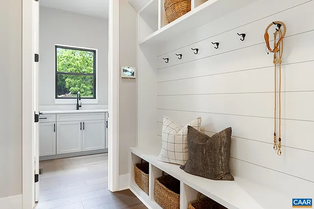 a bathroom with a double vanity sink and window