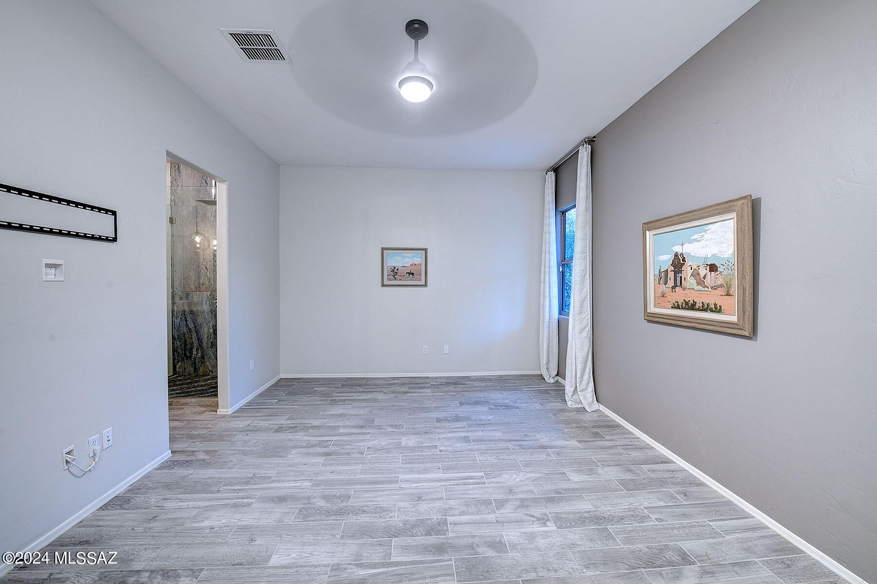 15084 North Pelham Road Tucson, AZ 85739 - Photo 18 of 40 wooden floor in an empty room