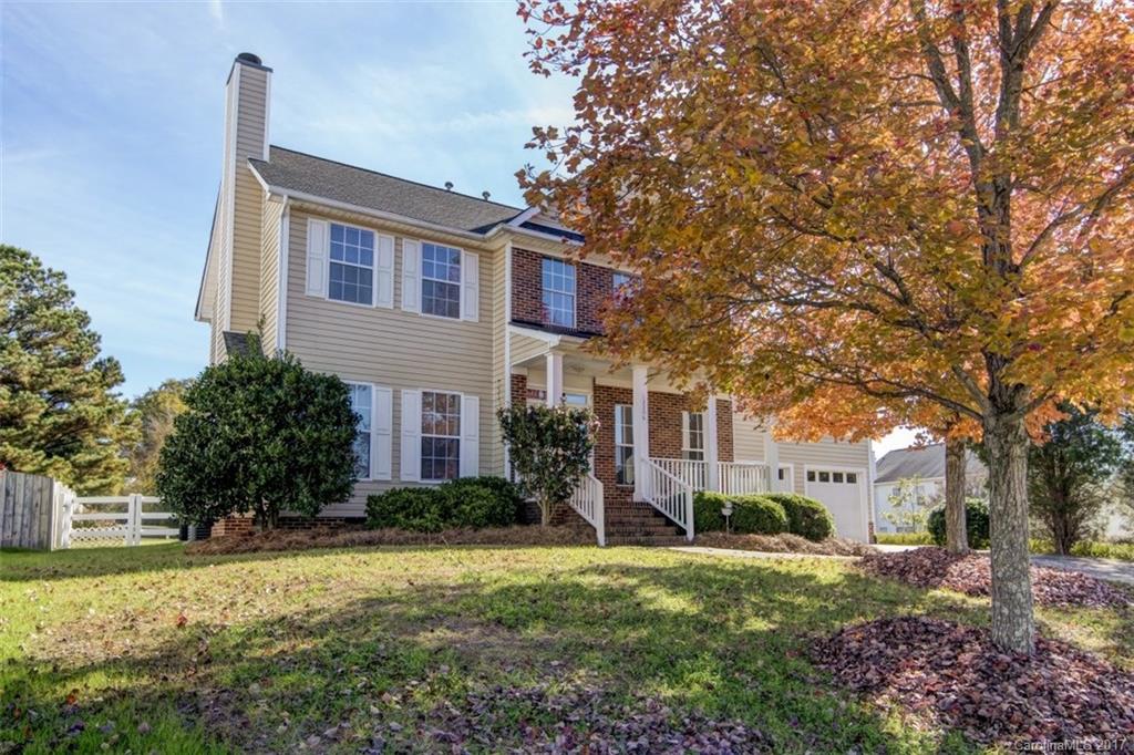 12206 Marathon Hill Road Charlotte, NC 28269 - Photo 2 of 23 a front view of a house with garden