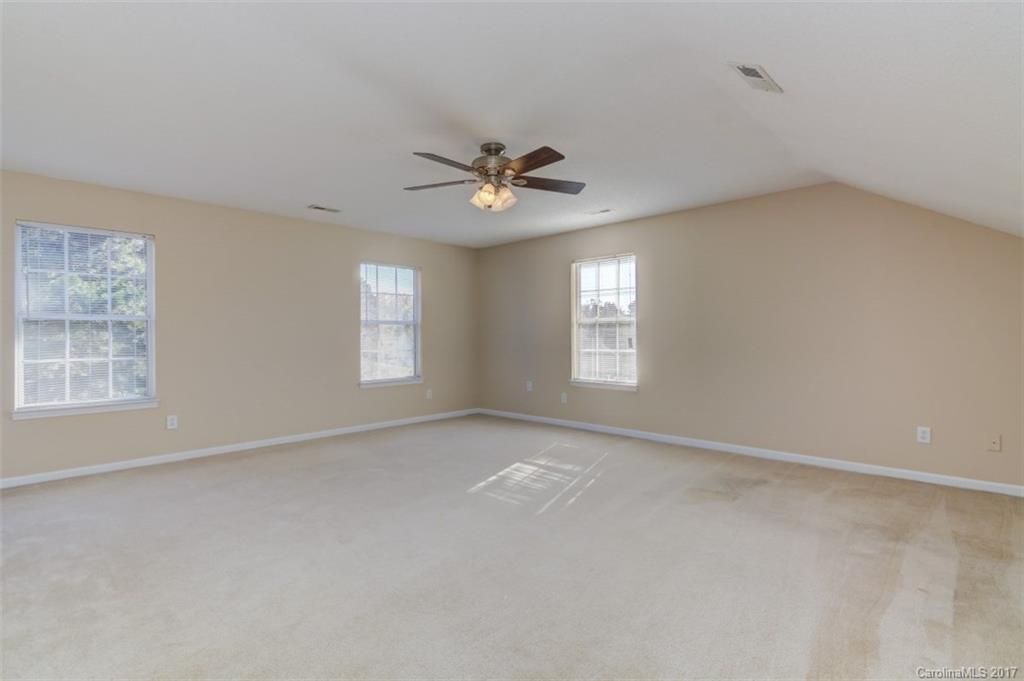 12206 Marathon Hill Road Charlotte, NC 28269 - Photo 16 of 23 a view of an empty room with a window