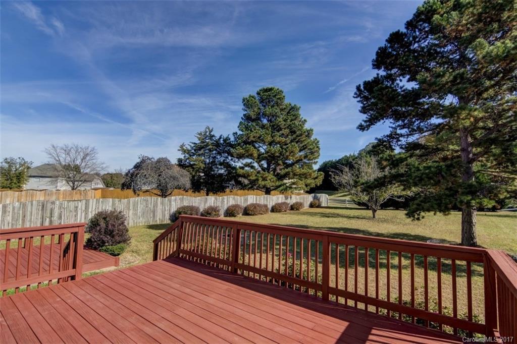 12206 Marathon Hill Road Charlotte, NC 28269 - Photo 22 of 23 a view of balcony with wooden floor and lake view
