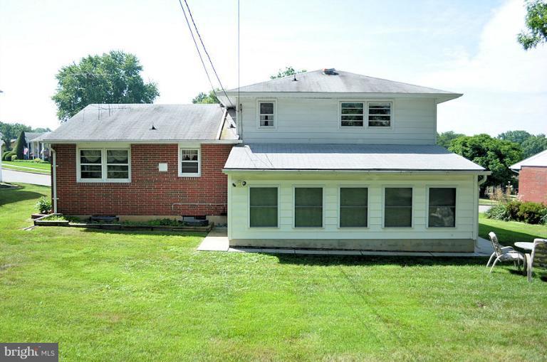 1407 Mt Airy Road Rosedale, MD 21237 - Photo 2 of 27 Brick & siding with rear entrance thru sunroom