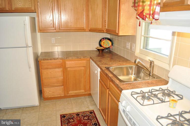 1407 Mt Airy Road Rosedale, MD 21237 - Photo 12 of 27 Kitchen has new cabinets, counters & ceramic floor