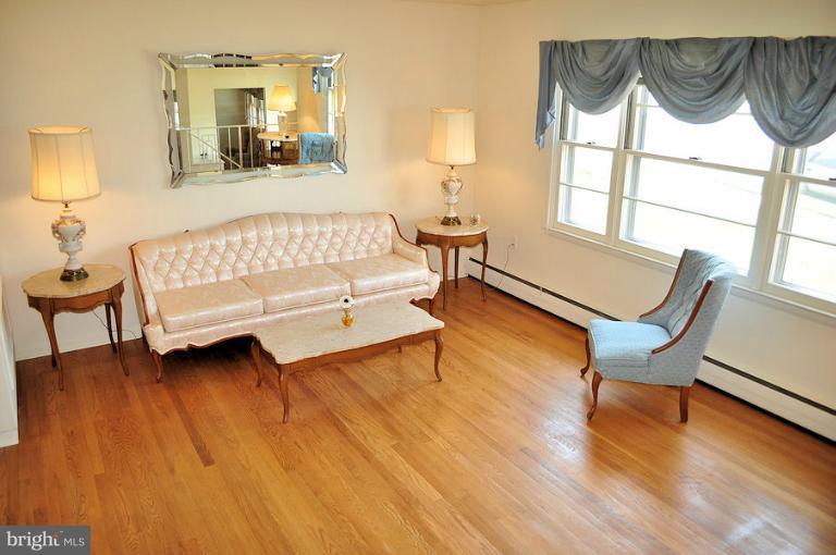 1407 Mt Airy Road Rosedale, MD 21237 - Photo 13 of 27 Beautiful hardood floor in living room