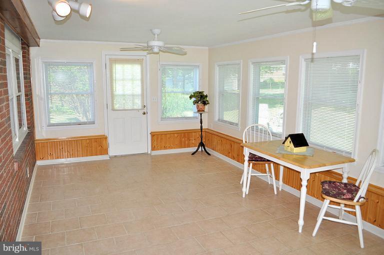 1407 Mt Airy Road Rosedale, MD 21237 - Photo 19 of 27 Sunroom for year-round relaxation