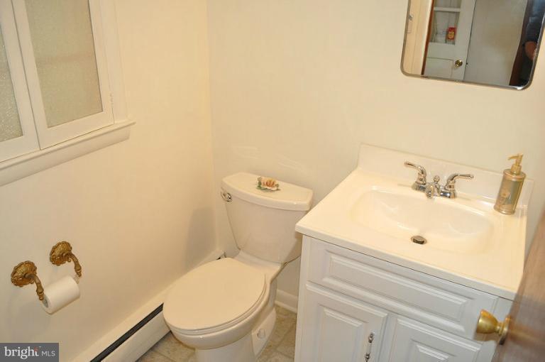 1407 Mt Airy Road Rosedale, MD 21237 - Photo 23 of 27 Powder room off family room