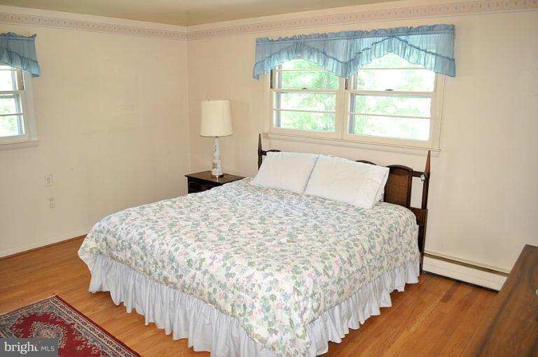 1407 Mt Airy Road Rosedale, MD 21237 - Photo 9 of 27 Harwood floor in master bedroom