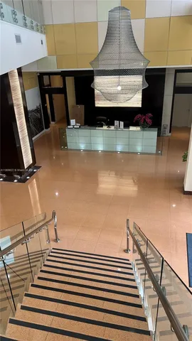 a kitchen with a sink and a stove top oven