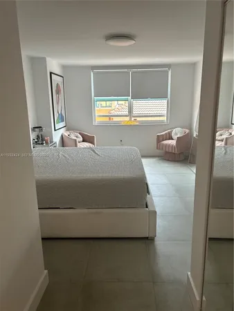 a en suite bathroom with a sink and a mirror