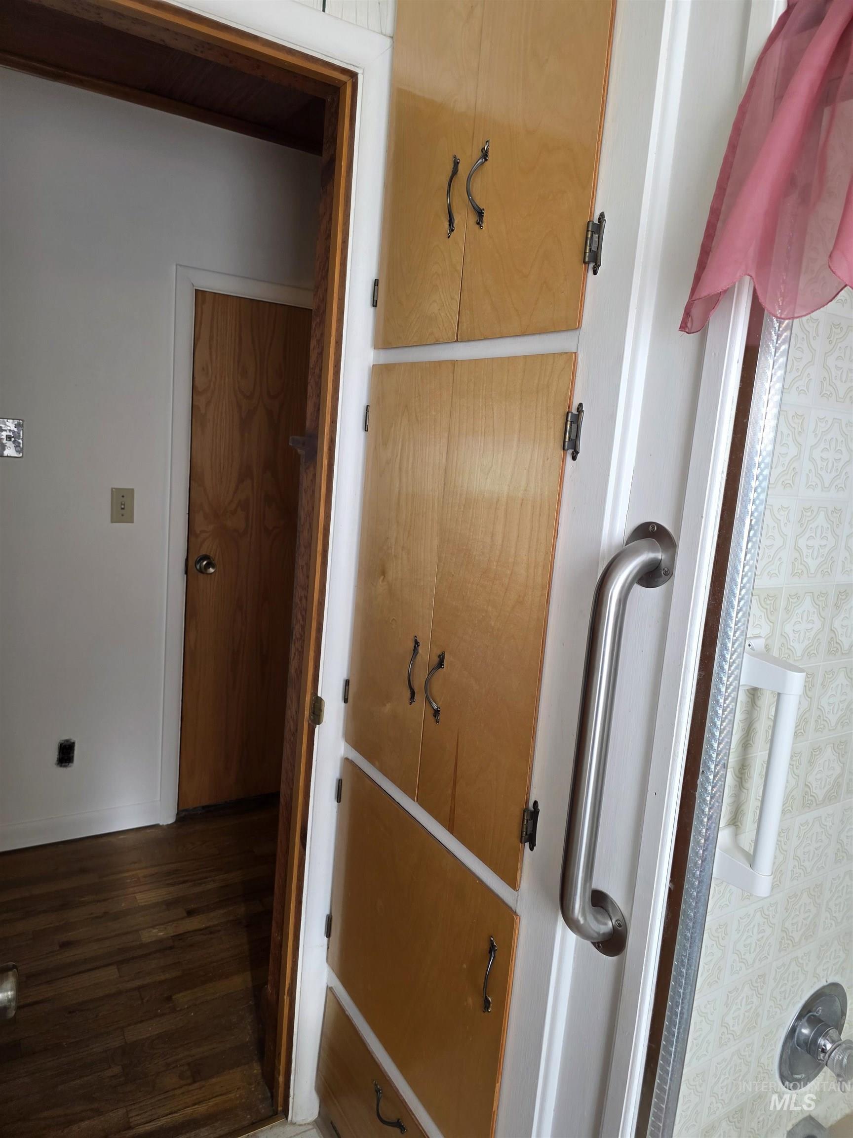 909 12th Street Kamiah, ID 83536 - Photo 19 of 36 Bathroom featuring wood finished floors and baseboards