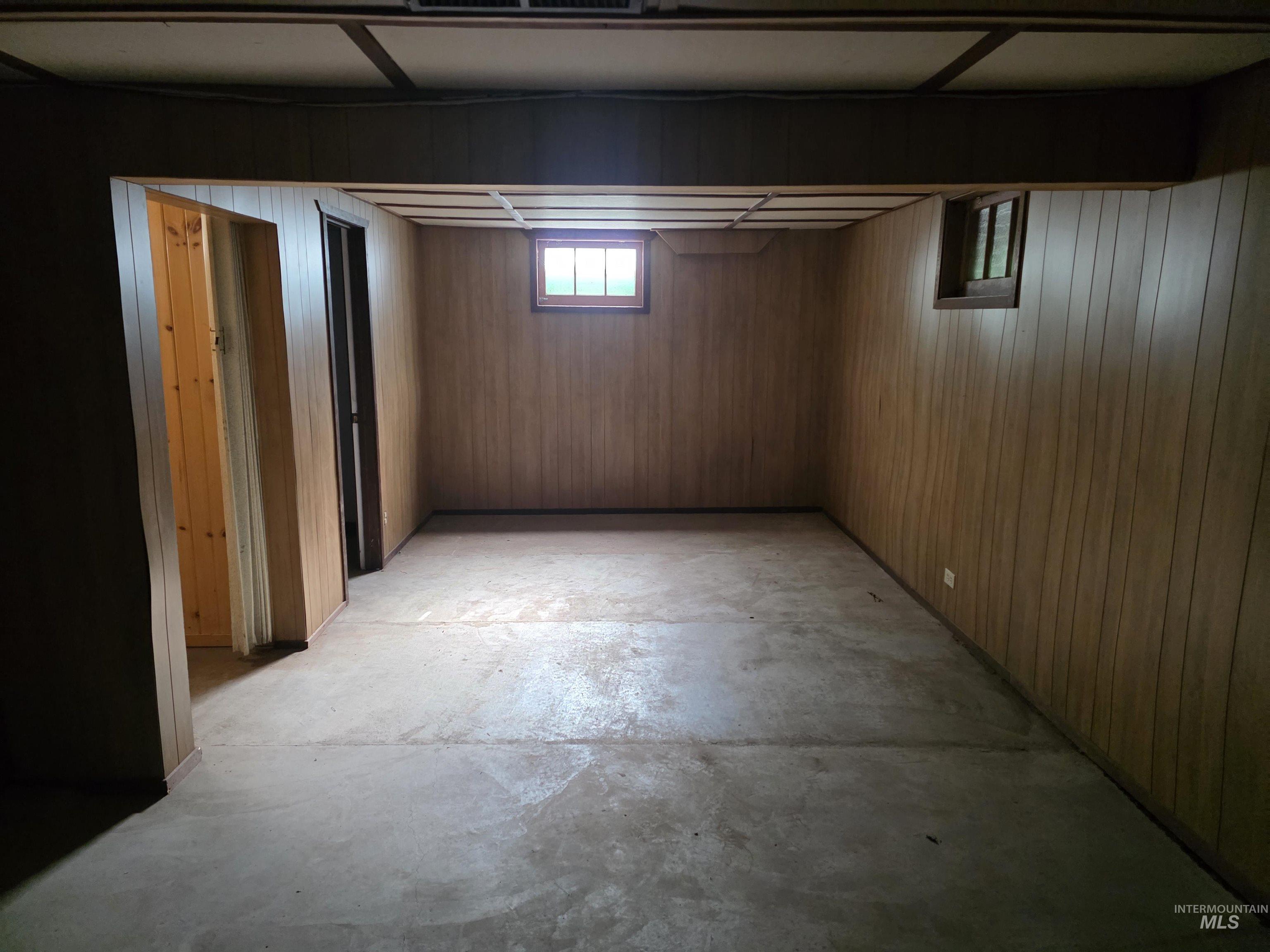 909 12th Street Kamiah, ID 83536 - Photo 26 of 36 Below grade area featuring wooden walls