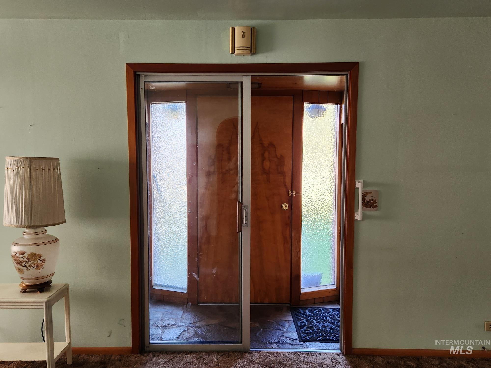 909 12th Street Kamiah, ID 83536 - Photo 7 of 36 Foyer entrance with baseboards and stone finish flooring