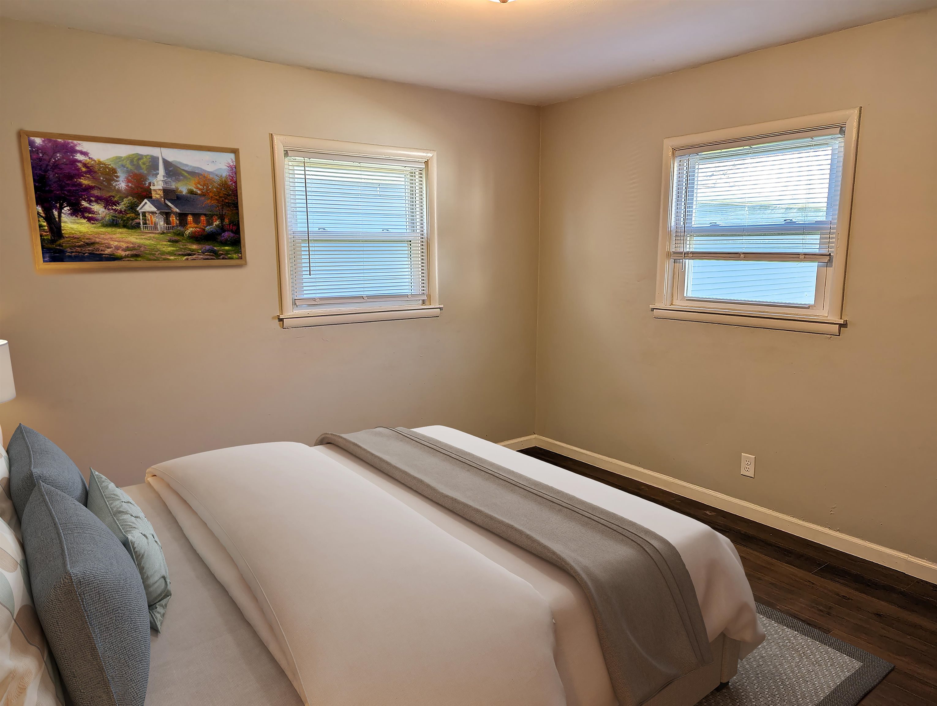 2080 Lancaster Heights Road Freeport, IL 61032 - Photo 11 of 17 a bedroom with bed and wall painting