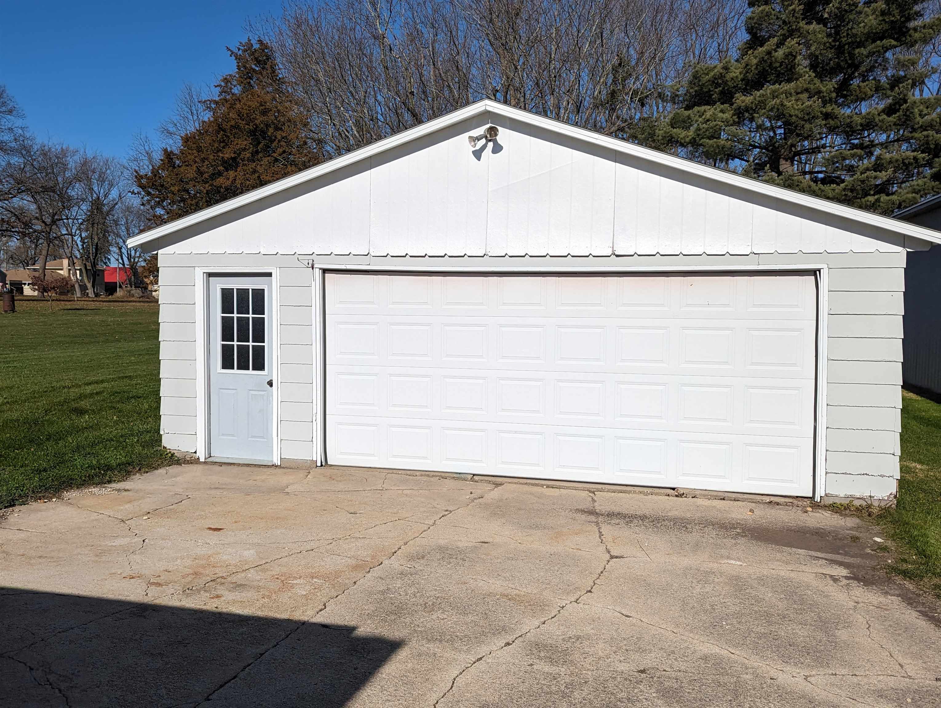 2080 Lancaster Heights Road Freeport, IL 61032 - Photo 16 of 17 a white house with a outdoor space