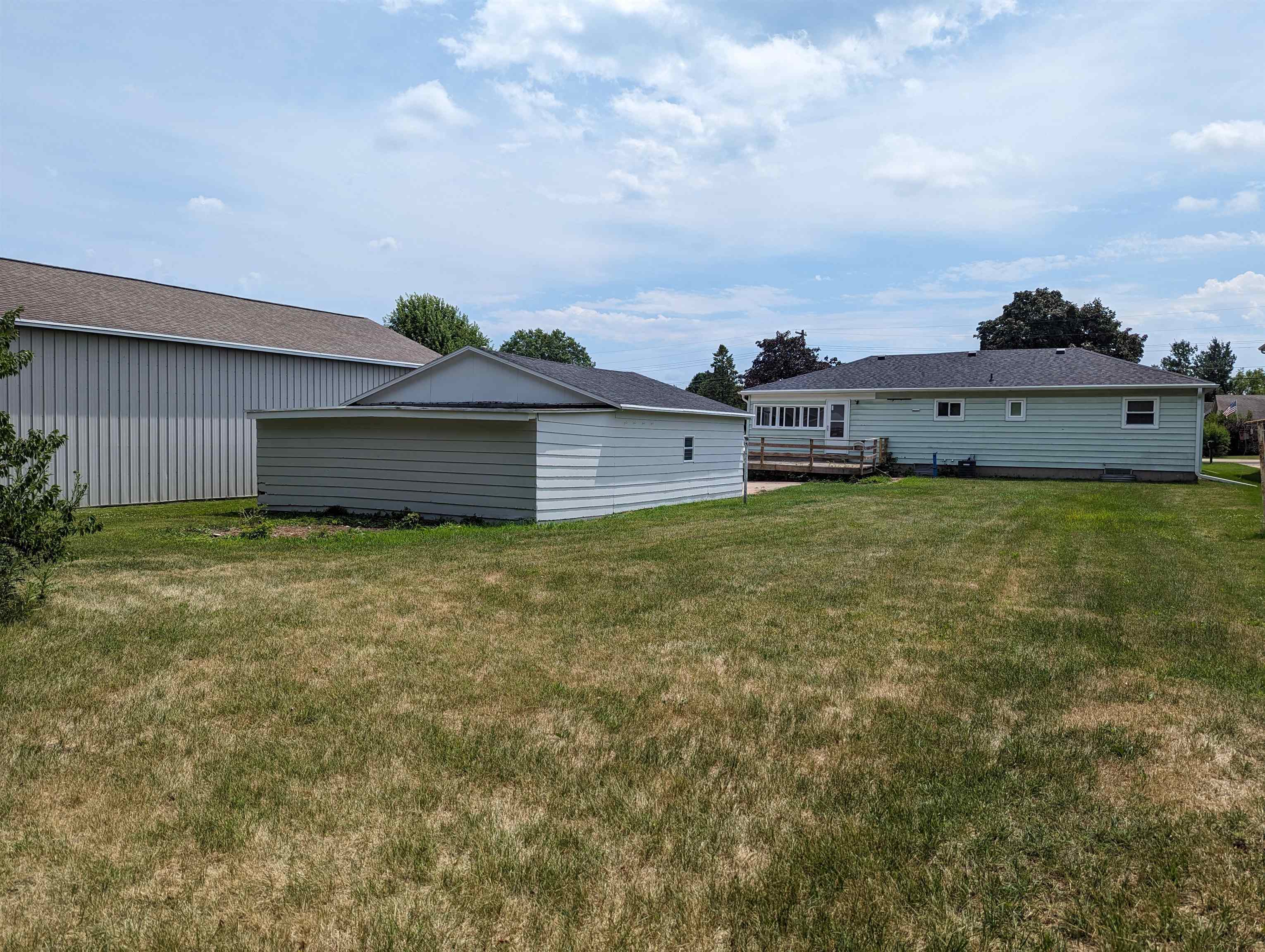 2080 Lancaster Heights Road Freeport, IL 61032 - Photo 17 of 17 a front view of a house with a garden and yard