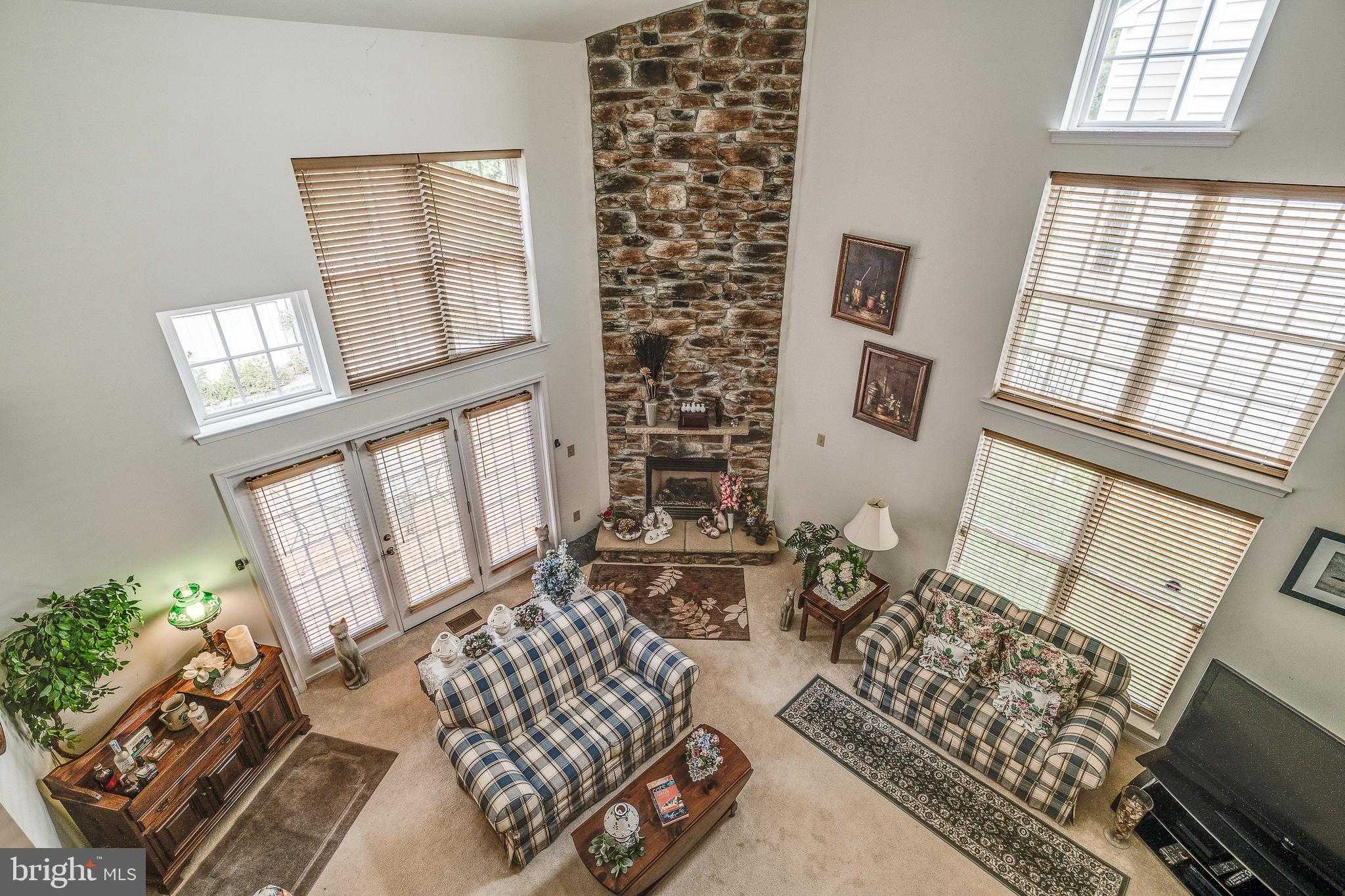 687 Hunters Road Culpeper, VA 22701 - Photo 13 of 57 a living room with furniture and a large window