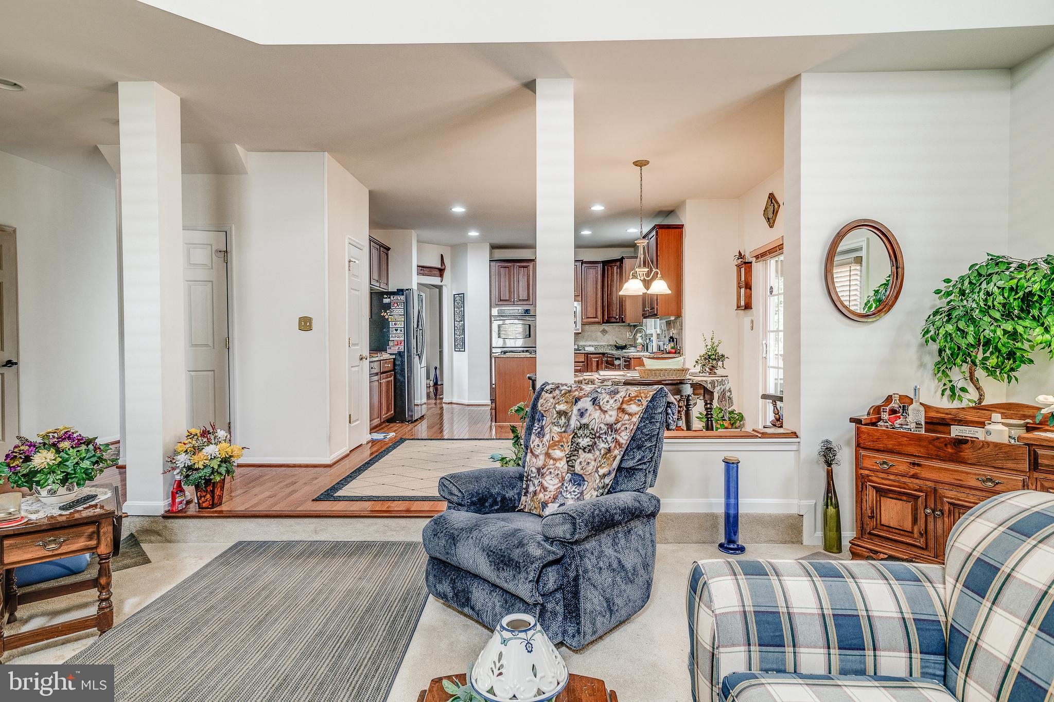 687 Hunters Road Culpeper, VA 22701 - Photo 16 of 57 a living room with furniture and wooden floor
