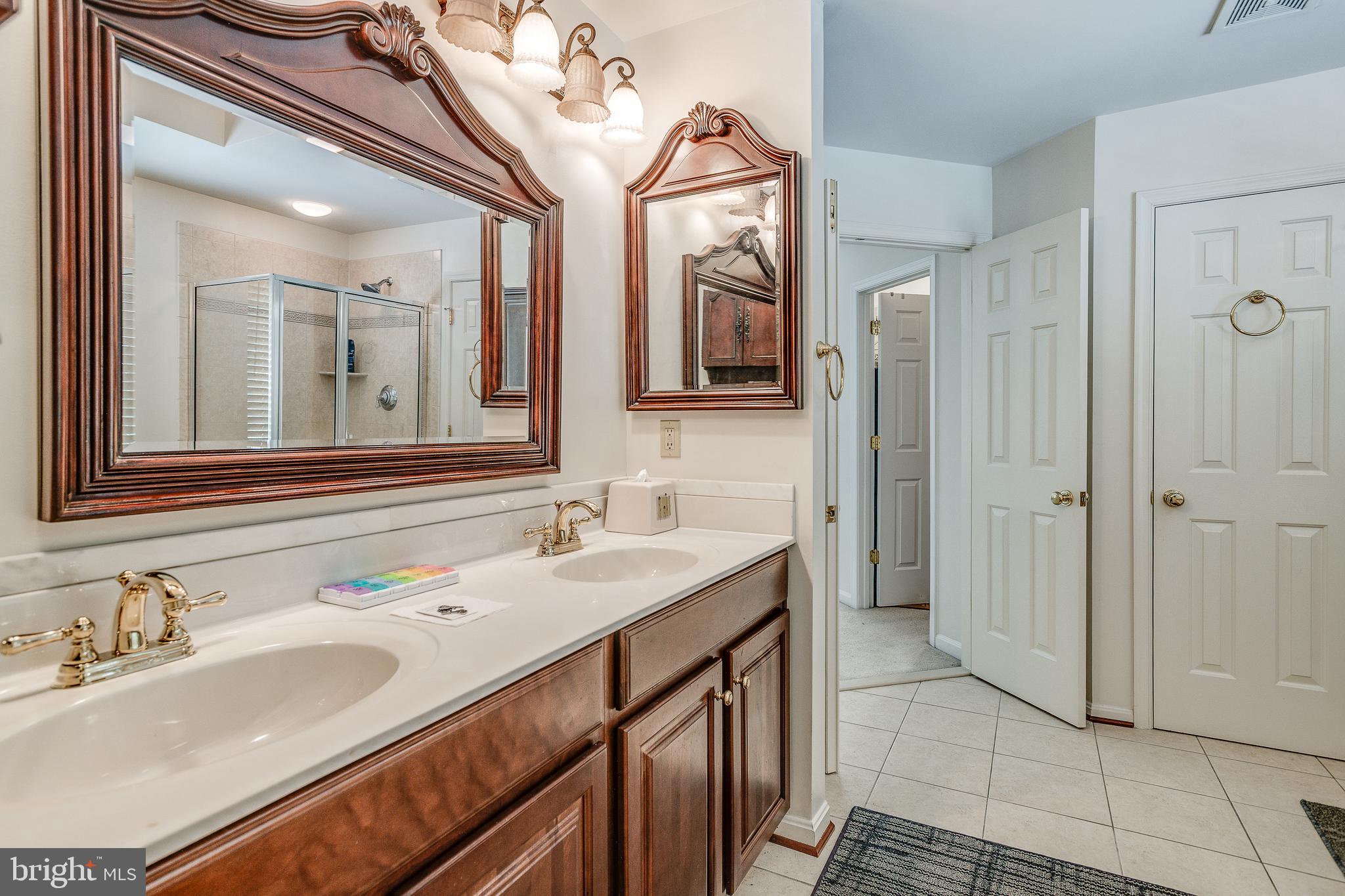 687 Hunters Road Culpeper, VA 22701 - Photo 26 of 57 a bathroom with a sink and a mirror