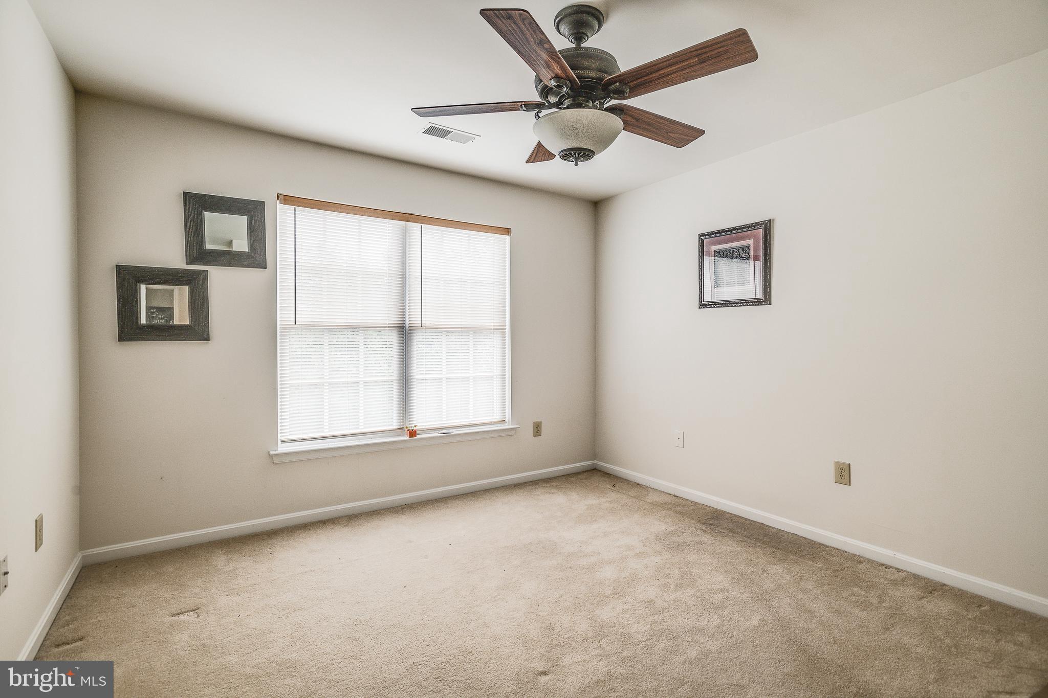 687 Hunters Road Culpeper, VA 22701 - Photo 29 of 57 an empty room with a window