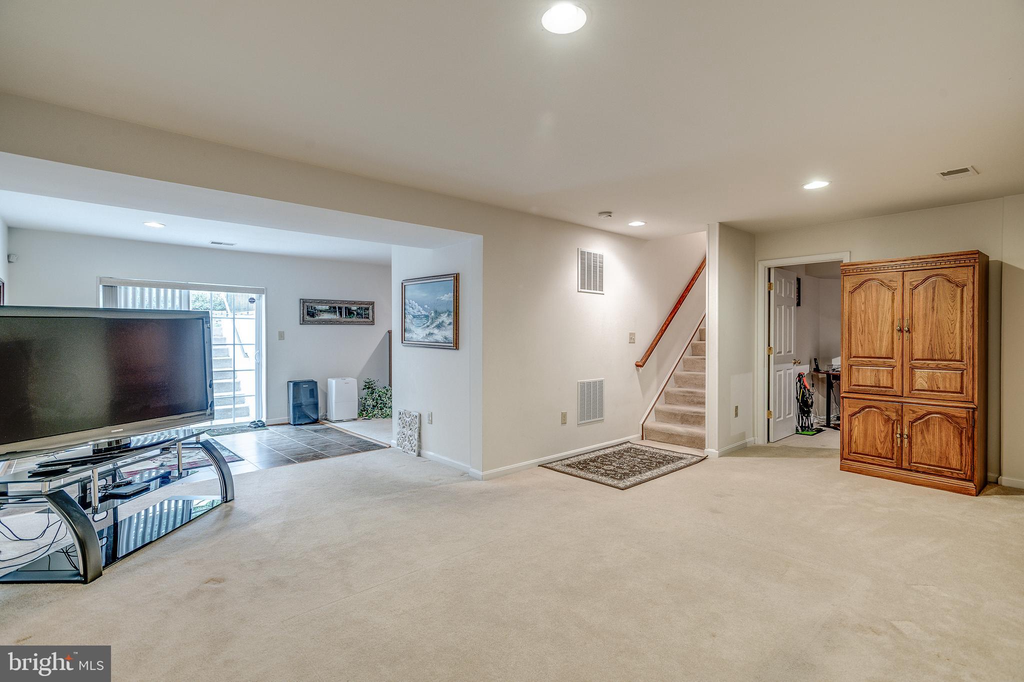 687 Hunters Road Culpeper, VA 22701 - Photo 34 of 57 a living room with furniture and a flat screen tv